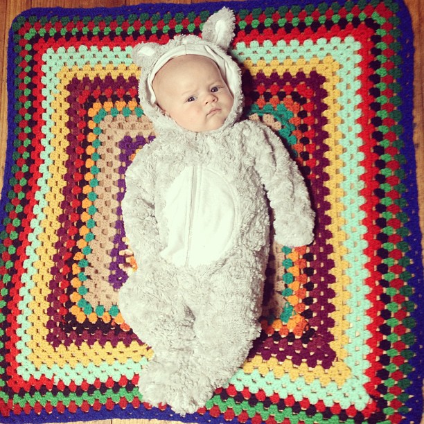 A very serious #babyjagoe in a rabbit suit.