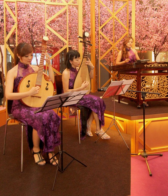 Chinese instrumental band wowing the shoppers with their performance at Avenue K this Chinese New Year