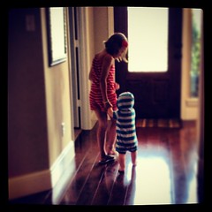 She is helping him walk. #littlesteps #sheloveshim