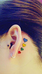 Ear back tattoo