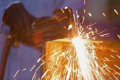 worker use acetylene torch to cutting metal