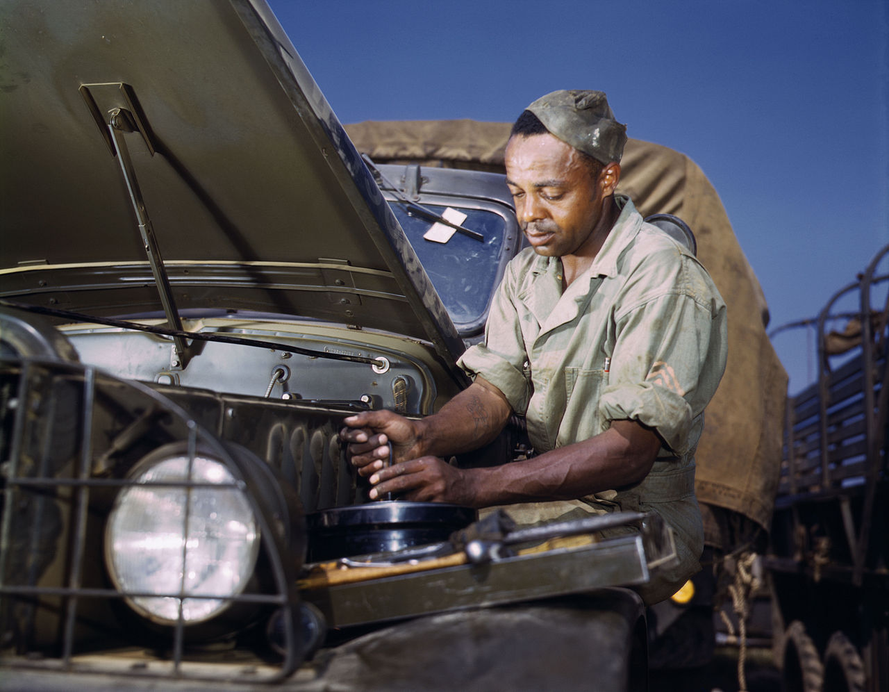 Cleaning the air filter of an army truck 1942