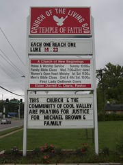 Church signs in Ferguson after the shooting