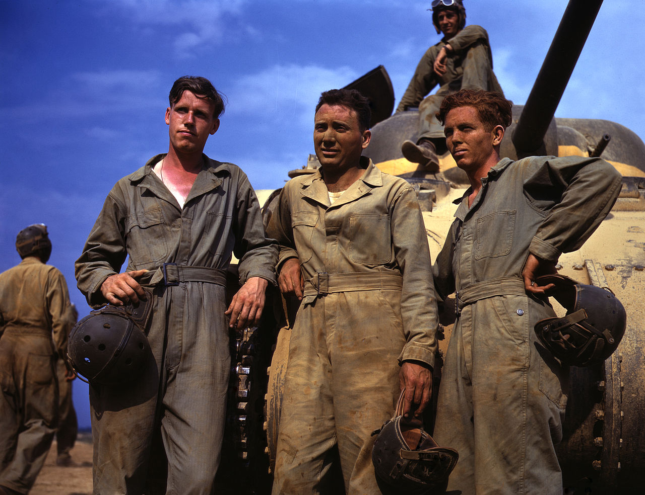 Tank crew standing in front of M4 Sherman tank; Fort Knox, Kentucky, 1942