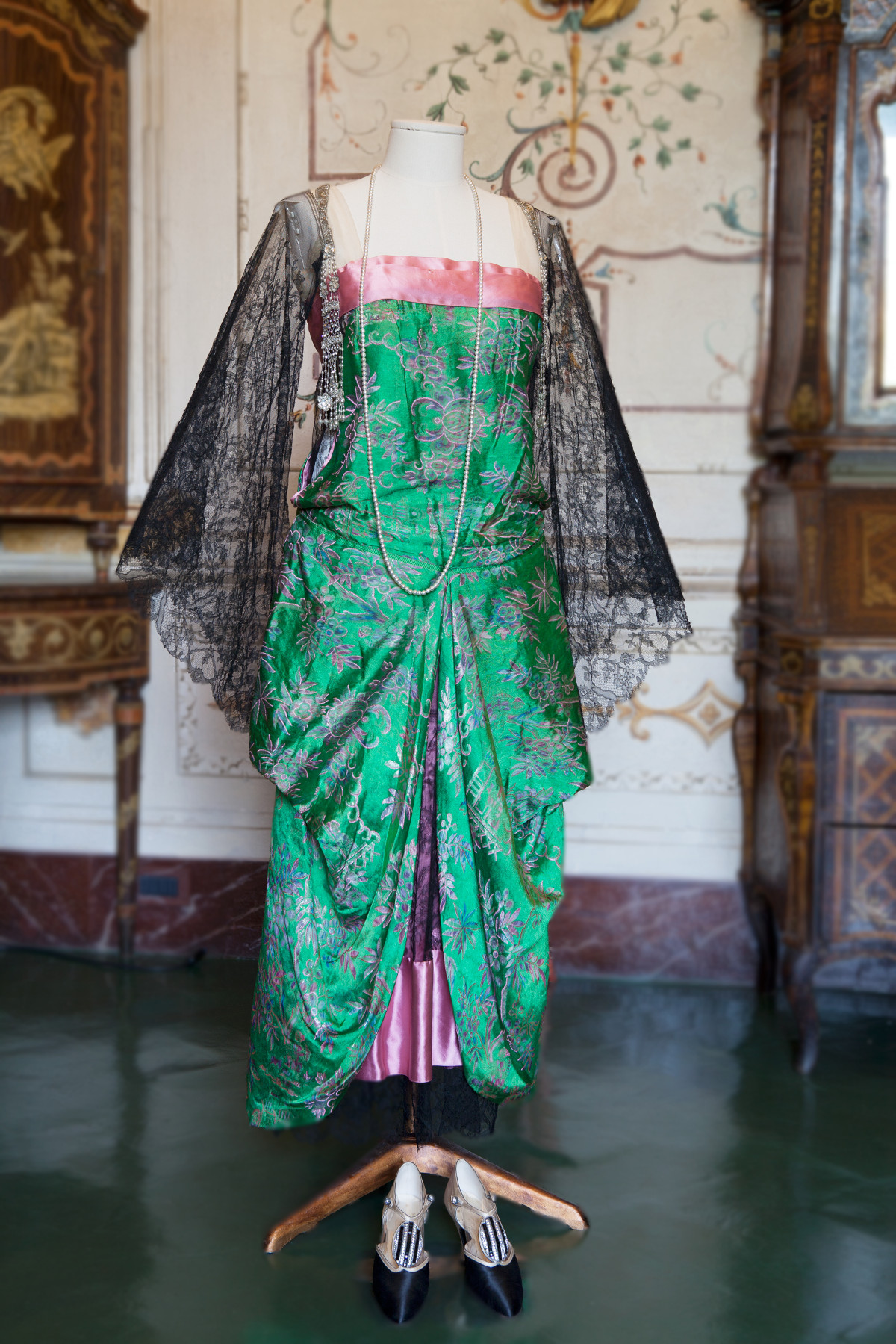 1920s. Green and Pink Silk. Passementerie tassels composed of rhinestones, pearls and beads that hang from either shoulder. Acton Art Collection - Villa La Pietra