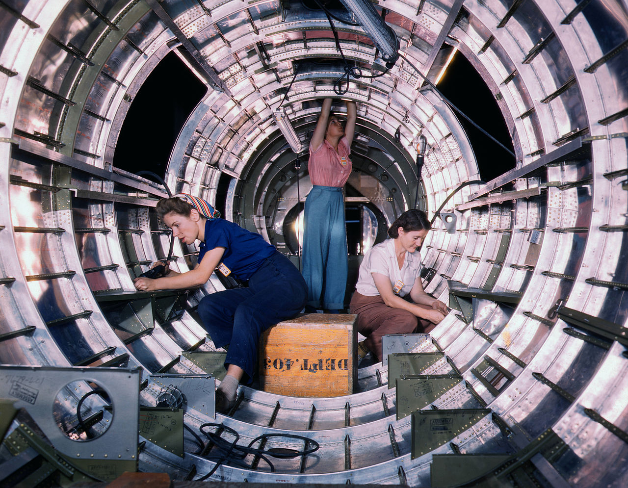 Women workers install fixtures and assemblies to a tail fuselage section of a B-17 bomber at the Douglas Aircraft Company plant, Long Beach, Calif. Better known as the "Flying Fortress," the B-17F is a later model of the B-17, which distinguished itself i