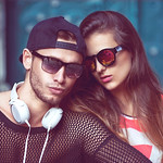 Sexy and fashionable couple in sunglasses. Vogue