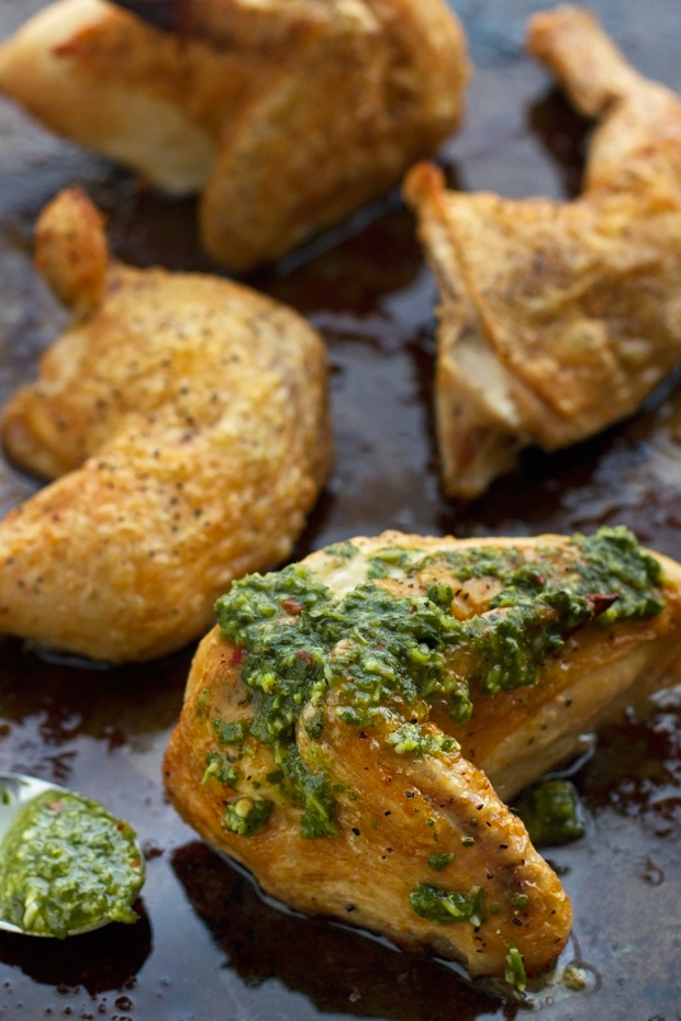 Quarted ROasted Chicken with Chimichurri Sauce - 5 simple ingredients and this is truly the crispiest chicken you'll ever experience! #chimichurrisauce #roastedchicken #bakedchicken #crispychicken | Littlespicejar.com