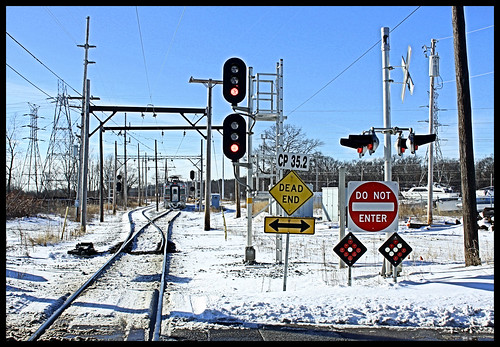 road street camera city railroad blue red sky chicago west electric digital canon lens dead eos reflex high nw do day dynamic northwest image bend michigan south north indiana rail railway running clear signals stop shore single signage end css service imaging 10th passenger enter interurban dslr approach sheridan range overhead hdr freight catenary in ind 50d xti laportecounty csssb