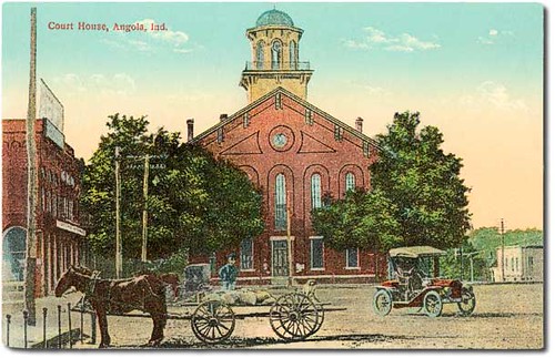 horses people usa man color men history cars buildings walking indiana streetscene transportation shops pedestrians courthouse storefronts automobiles businesses wagons angola steubencounty hoosierrecollections