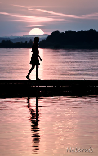 chiemsee alone black child cloud clouds contour dark disc disk dusk evening figure girl kid lake mirror one outline person reflection romance romantic silhouette single sky sun sunrise sunset twilight water waves