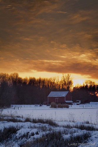 railroad trees sunset snow clouds barn tracks