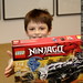 nick opens a big lego kit from his grandparents