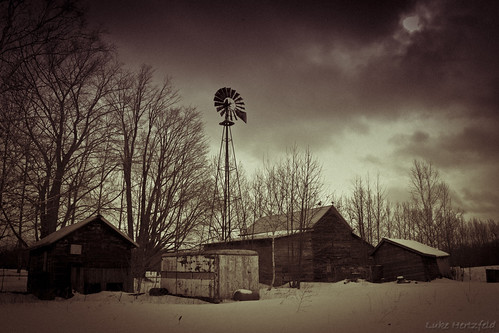 old travel trees winter bw snow tree texture ice windmill clouds rural countryside midwest moody michigan farm country barns orchard nostalgia worn upnorth derelict rundown oceana westmichigan woodensiding oceanacounty michigantravel puremichigan