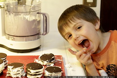 making a special black & white birthday cake for his… 