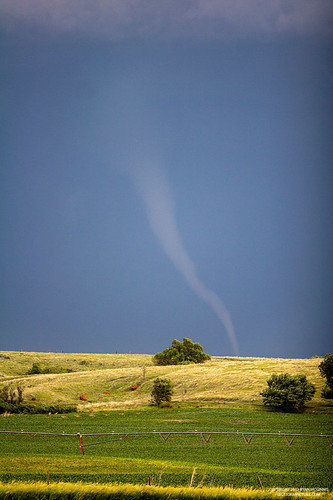 white storm green grass chase getty tornado distant webres mcginnis
