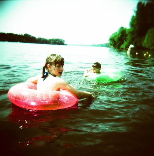 boy summer film water girl wisconsin kids analog mediumformat children square xpro crossprocessed sister brother lofi july 120film rings floaties holga120cfn velvia50 2011 lakewissota lakewissotastatepark fujivelvi50