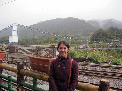 Mei with the suspension bridge