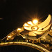 The Art Science Museum (Singapore) by night.  This lotus-shaped museum collect rains and light for the museum's use