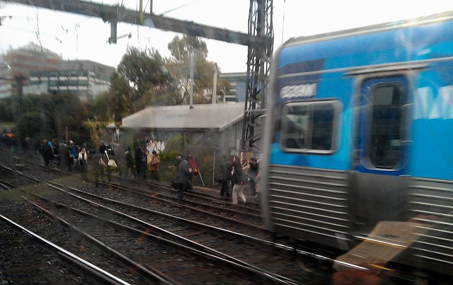 Passengers evacuate a train at Caulfield, 25/6/201227a