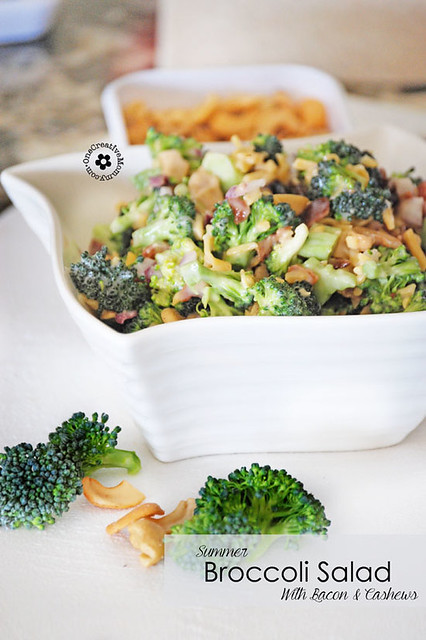 Summer Broccoli Salad with Bacon & Cashews in a white bowl. 