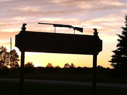 sunset silhouette sign gun wi tworivers