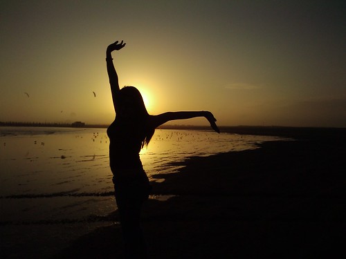 sunset galveston beach yoga evening coast silouette