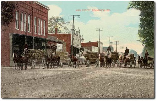 horses people usa man color men history buildings workmen indiana streetscene machinery transportation shops storefronts grandview businesses wagons spencercounty hoosierrecollections