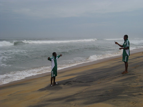 ocean men beach canon grey football waves soccer cellphone atlantic monrovia liberia