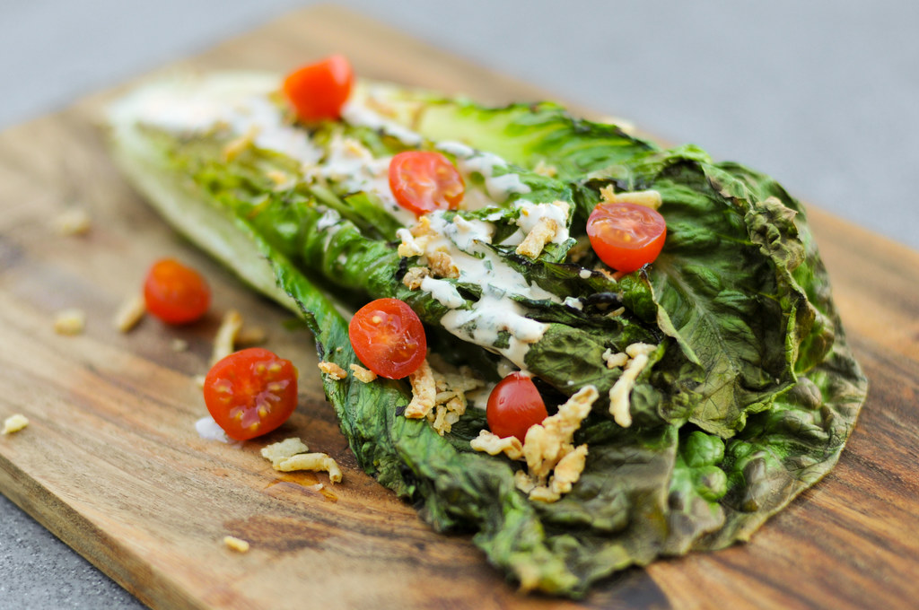 Grilled Romaine Salad with Spicy Ranch, Tomatoes, and Fried Onions