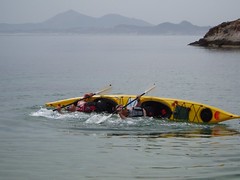 Greg & Rod rolling a double kayak Image