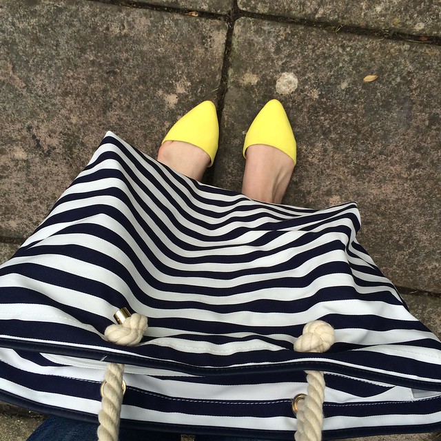 Yellow two part flats and striped beach bag from Next.