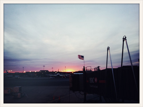 sunset sky airplane airport flag newark suns