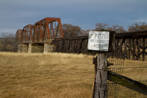 ranch bridge usa storm field rain weather sign rural fence landscape countryside texas cloudy ominous stormy comfort hillcountry railwaybridge notrespassing 2010 privateproperty