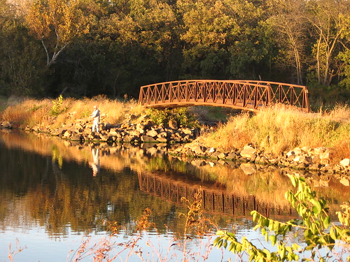 bridge autumn lake fisherman