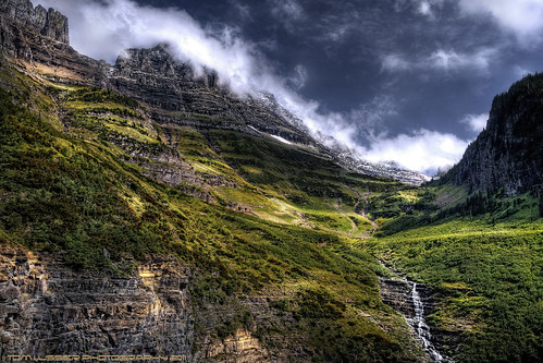 mountain snow clouds landscape waterfall nikon rockymountains glaciernationalpark d300 goingtothesunroad tomlussier