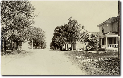 houses people usa man men history fence buildings walking general furniture indiana streetscene transportation porch shops pedestrians hotels storefronts grocery buggy residential buggies businesses spartanburg chenoweth randolphcounty realphoto hoosierrecollections