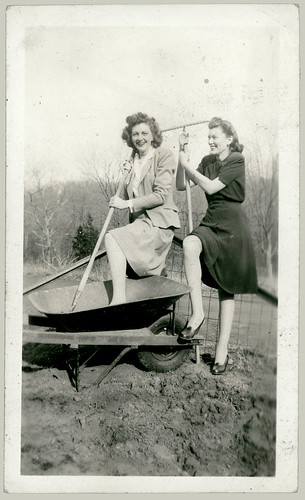 Two women and a Wheel Barrow