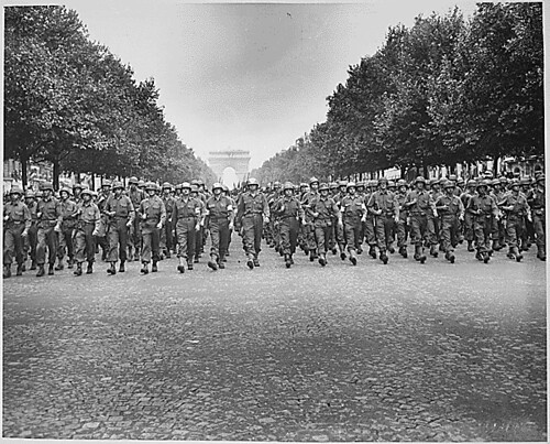 American troops of the 28th Infantry Division march down the Champs Elysees, Paris, in the "Victory" Parade., 08/29/1944