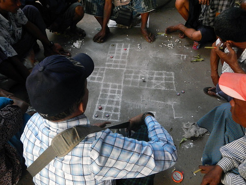 in Yangon a game scratched in the ground