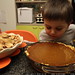sequoia sniffs the pumpkin pie he helped make