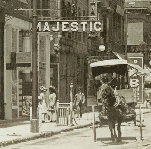 horses people usa signs man men history sepia buildings walking advertising awning hardware clothing hats indiana streetscene bicycles departmentstore transportation shops pedestrians storefronts theaters doctors buggy muncie buggies businesses wagons theatres lampposts streetcars delawarecounty realphoto hoosierrecollections
