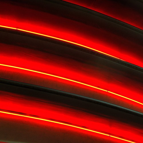 red abstract geometric night lights neon arc noflash burbank loehmanns