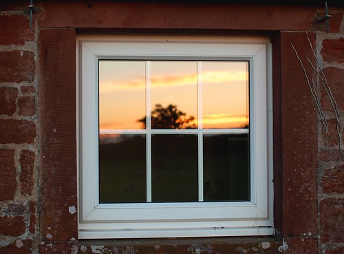 sunset reflection building brick window clouds rural countryside cumbria