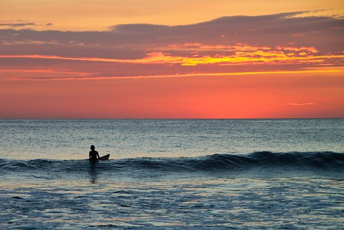 ocean sunset costarica solitude pacific surfer horizon wave