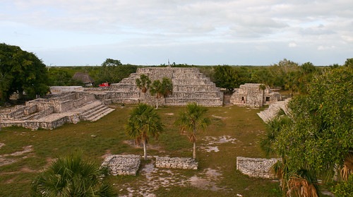 trees houses homes panorama industry archaeology grass architecture clouds buildings palms mexico landscapes ruins rooms december doors maya salt terraces cities cityscapes yucatan palmtrees commercial mayan temples restored pyramids urbanism religions palaces platforms streetscapes 2010 dwellings entrances cisterns deciduoustrees excavated stonebuildings chultun yuc xcambo lateclassic 122610 copyright2010jamesaglazierandjamesaferguson 850ad1000ad