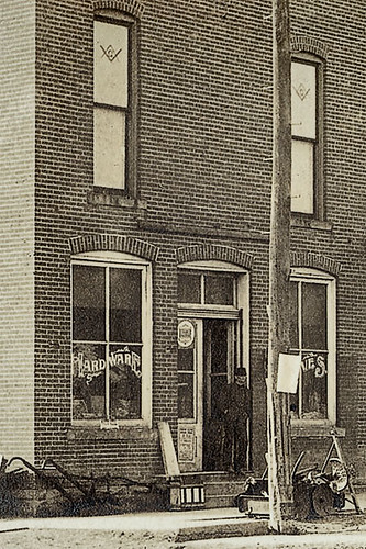 horses people usa signs man men history sepia brooklyn buildings walking advertising awning hardware shoes workmen mail postoffice indiana streetscene transportation drugs shops pedestrians storefronts buggy buggies businesses morgancounty realphoto hoosierrecollections
