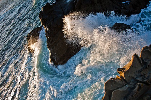 california sunset west rock coast wave swirl splash bluegreen