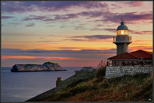 sunset sea españa lighthouse sunrise landscape mar nikon paisaje explore esp cantabria suances d300s magicalskiesmick