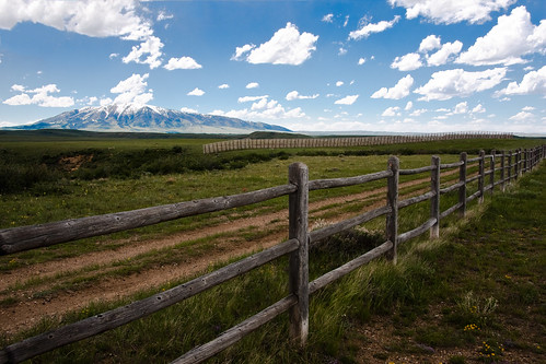 road mountain fence landscape wyoming